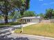 Charming home with a well-manicured lawn and a welcoming driveway at 2204 Jennifer Ln, Valrico, FL 33594