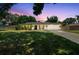 Charming single-story home with a well-manicured lawn and an attached two-car garage at 2204 Jennifer Ln, Valrico, FL 33594