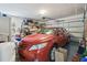 Organized garage with ample storage space and a modern garage door at 2204 Jennifer Ln, Valrico, FL 33594