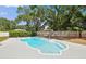 Sparkling pool with lounge area, ideal for enjoying the Florida lifestyle in a private backyard setting at 2204 Jennifer Ln, Valrico, FL 33594