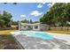 Inviting pool in backyard with patio, perfect for relaxing and entertaining guests on sunny days at 2204 Jennifer Ln, Valrico, FL 33594