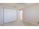 Bedroom with carpet floors and a large closet at 2314 50Th E Dr, Bradenton, FL 34203