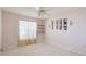 Cozy bedroom offering natural light, ceiling fan, and shelves at 2314 50Th E Dr, Bradenton, FL 34203