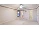 Large bedroom featuring neutral walls, ceiling fan, and natural light at 2314 50Th E Dr, Bradenton, FL 34203