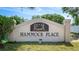 Entrance sign to Hammock Place, featuring a welcoming design and lush surroundings at 2314 50Th E Dr, Bradenton, FL 34203