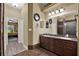 A large bathroom offers dual sinks, a vanity area, and a walk-in shower at 24498 Casey Rd, Brooksville, FL 34601