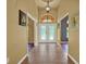 Entryway featuring decorative tile flooring and a view of elegant glass front doors at 24498 Casey Rd, Brooksville, FL 34601