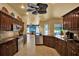 Spacious kitchen with stainless steel appliances, granite countertops, and an open floor plan at 24498 Casey Rd, Brooksville, FL 34601
