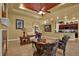 Bright living room with a fireplace, comfortable seating, and an open layout, and tile flooring at 24498 Casey Rd, Brooksville, FL 34601