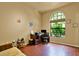 Office featuring wood floors and a large window for lots of natural light at 24498 Casey Rd, Brooksville, FL 34601