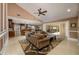 Bright and open living room with tile floors and access to the pool at 30314 Fairway Dr, Wesley Chapel, FL 33543