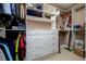Custom closet organizer with drawers, shelves, and hanging space for optimal storage at 30314 Fairway Dr, Wesley Chapel, FL 33543