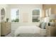 Comfortable bedroom with neutral tones, soft bedding, and a dresser, creating a relaxing atmosphere at 31556 Cardinal Yard Dr, San Antonio, FL 33576