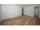 Bright bedroom with wood floors and closet space, perfect for relaxing and unwinding at 3847 Lighthouse Way # 3847, New Port Richey, FL 34652