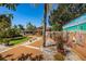 Charming condo community entrance with lush landscaping, creating an inviting and well-maintained outdoor space at 3847 Lighthouse Way # 3847, New Port Richey, FL 34652