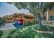 Charming townhome with covered parking and mature landscaping, creating a welcoming entrance at 3847 Lighthouse Way # 3847, New Port Richey, FL 34652