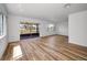 Spacious living room with wood floors and ample natural light at 3847 Lighthouse Way # 3847, New Port Richey, FL 34652