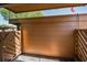 Private outdoor patio with wooden fence and shaded covering at 3847 Lighthouse Way # 3847, New Port Richey, FL 34652