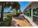 Poolside pathway adjacent to the building, providing easy access and a scenic route to the community pool area at 3847 Lighthouse Way # 3847, New Port Richey, FL 34652