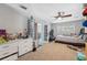 Bedroom with an open glass doors to dining area and a ceiling fan at 4715 W Montgomery Ave, Tampa, FL 33616