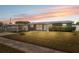 Charming single-story home featuring a covered carport and well-maintained front lawn at 4715 W Montgomery Ave, Tampa, FL 33616