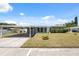 This single-story home has a carport and a well-maintained lawn in a suburban neighborhood at 4715 W Montgomery Ave, Tampa, FL 33616
