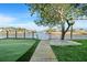 Beautiful canal views, a putting green, and lush landscaping provide a tranquil backyard oasis at 4968 Southshore Dr, New Port Richey, FL 34652