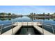 Private dock and boat slip offers direct access to the canal, perfect for boating and waterfront enjoyment at 4968 Southshore Dr, New Port Richey, FL 34652