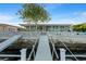 Waterfront home with large dock and beautiful mosaic tile art at water's edge at 4968 Southshore Dr, New Port Richey, FL 34652
