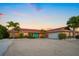 Lovely single story home featuring well manicured landscaping and a paved driveway at 4968 Southshore Dr, New Port Richey, FL 34652