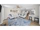 Open-concept living room provides ample seating and an inviting atmosphere, seamlessly connecting to the dining area at 4968 Southshore Dr, New Port Richey, FL 34652