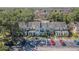 Townhouses feature colorful facades and landscaping, providing a vibrant and inviting place to call home at 6343 Osprey Lake Circle, Riverview, FL 33578