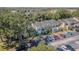 Enjoy the mature trees and landscaping, providing shade and natural beauty to the townhouse community at 6343 Osprey Lake Circle, Riverview, FL 33578