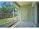 Screened-in patio offering a private outdoor space with a view of the yard at 6343 Osprey Lake Circle, Riverview, FL 33578