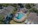 An inviting pool area is surrounded by lush landscaping, perfect for relaxation and enjoyment at 6343 Osprey Lake Circle, Riverview, FL 33578