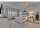 Bedroom with bright light coming through plantation shutters at 718 Manns Harbor Dr, Apollo Beach, FL 33572