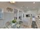 View of kitchen and dining nook in an open floor plan, seamlessly connects to other living spaces at 718 Manns Harbor Dr, Apollo Beach, FL 33572