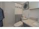Bright bathroom featuring a shower and modern fixtures at 7301 2Nd S Ave, St Petersburg, FL 33707