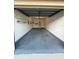 Spacious two-car garage with overhead lighting and ample room for storage at 7601 Como Dr, New Port Richey, FL 34655