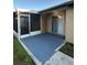 Covered and screened in patio with direct access to the backyard at 7601 Como Dr, New Port Richey, FL 34655