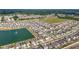 Picturesque aerial shot showcases the home and its proximity to green spaces and water at 7782 Sail Clover Ln, Zephyrhills, FL 33540