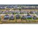 Scenic aerial view of neighborhood homes and landscaping, capturing the serene community at 7782 Sail Clover Ln, Zephyrhills, FL 33540