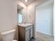 This half-bathroom has a modern sink and vanity at 7782 Sail Clover Ln, Zephyrhills, FL 33540