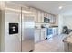 Kitchen with stainless steel appliances, granite countertops, and light wood cabinetry at 7782 Sail Clover Ln, Zephyrhills, FL 33540