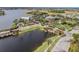Aerial view of community, showcasing lakes, lush landscaping, and elegant homes at 813 Manns Harbor Dr, Apollo Beach, FL 33572