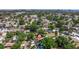 Overhead view showcasing home, mature trees, and location in a quiet neighborhood at 8401 Stillbrook Ave, Tampa, FL 33615