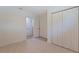 Spacious bedroom features a large closet and doorway at 8401 Stillbrook Ave, Tampa, FL 33615