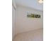 Bright bedroom with a window offering a view of tropical foliage at 8401 Stillbrook Ave, Tampa, FL 33615