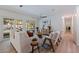 Bright and airy living room with access to the pool, modern furniture and decor at 8401 Stillbrook Ave, Tampa, FL 33615