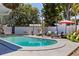 Beautiful backyard with a refreshing pool and outdoor lounge area at 8401 Stillbrook Ave, Tampa, FL 33615